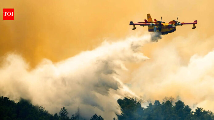 Wildfire southwest of Denver forces thousands to evacuate and destroys more than 160 structures